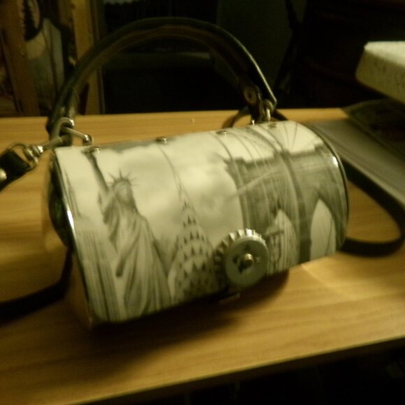 Prezzo metal new York round purse with leather straps. - Picture 1 of 5